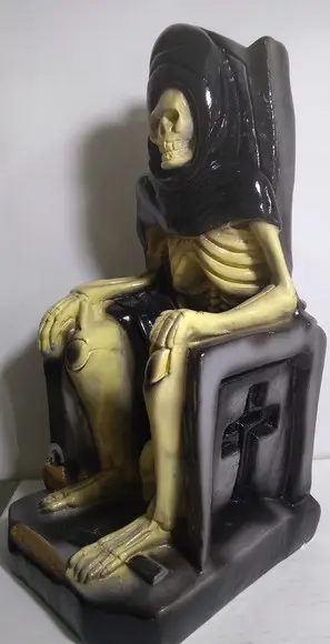 Imagem Exu Tata Caveira Escultura Exu Tata Caveira no Trono