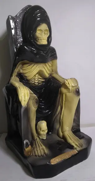 Imagem Exu Tata Caveira Escultura Exu Tata Caveira no Trono