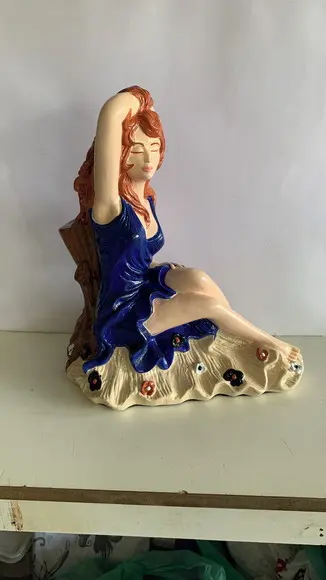 Pomba Gira Menina da Praia Imagem da Pomba Gira Sentada