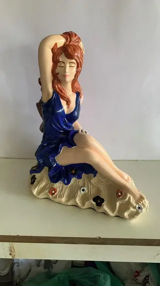 Pomba Gira Menina da Praia Imagem da Pomba Gira Sentada