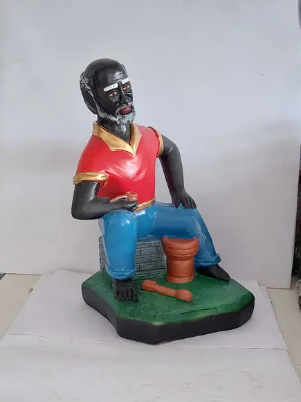 Preto Velho do Pilão Deitado Imagem Mestre do Pilão Deitado