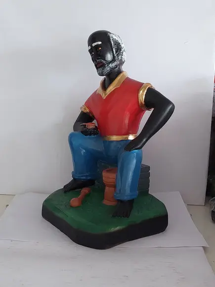 Preto Velho do Pilão Deitado Imagem Mestre do Pilão Deitado