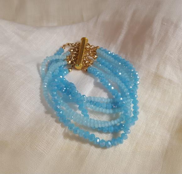 Pulseira Dourada com Cristais Azuis