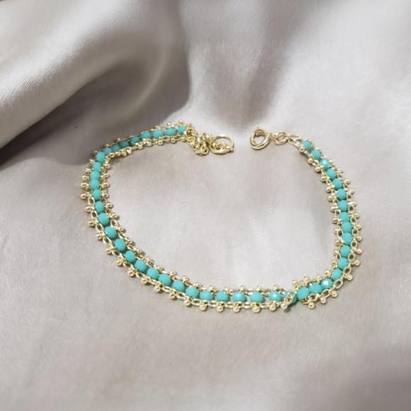 Pulseira Dourada com Cristais Azuis