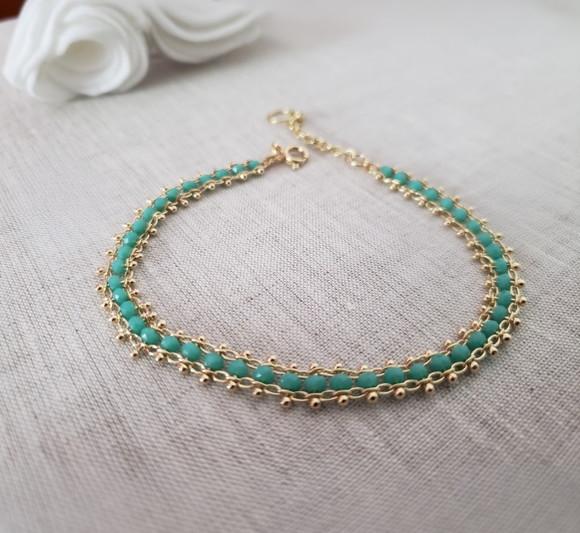 Pulseira Dourada com Cristais Azuis
