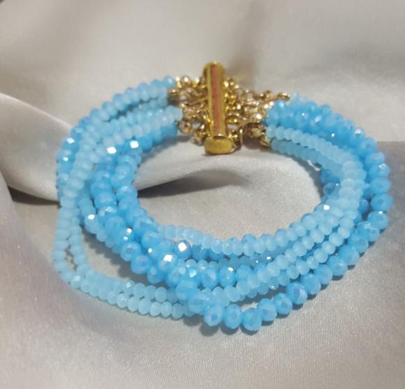 Pulseira Dourada com Cristais Azuis