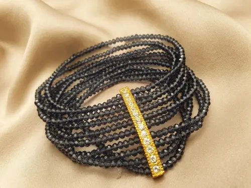 Bracelete Dourado com Cristais Ametista