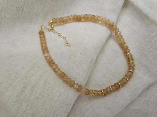 Colar de Cristal Rutilado Rondel e Entremeios Dourados