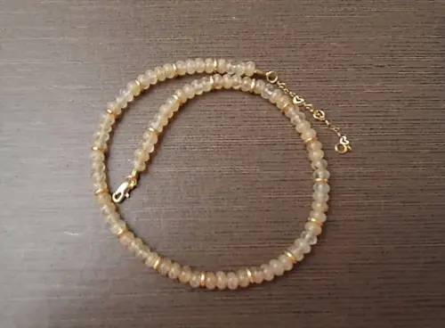 Colar de Cristal Rutilado Rondel e Entremeios Dourados