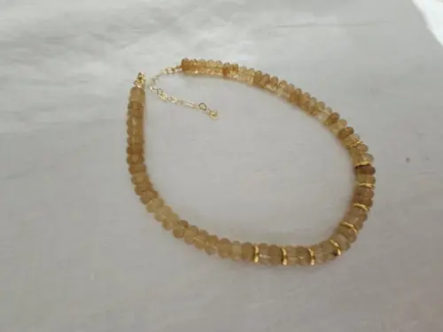Colar de Cristal Rutilado Rondel e Entremeios Dourados