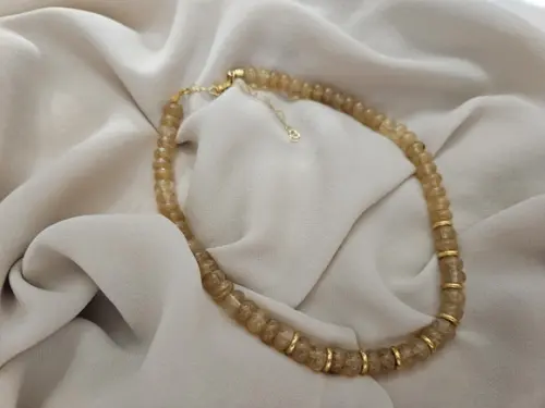 Colar de Cristal Rutilado Rondel e Entremeios Dourados