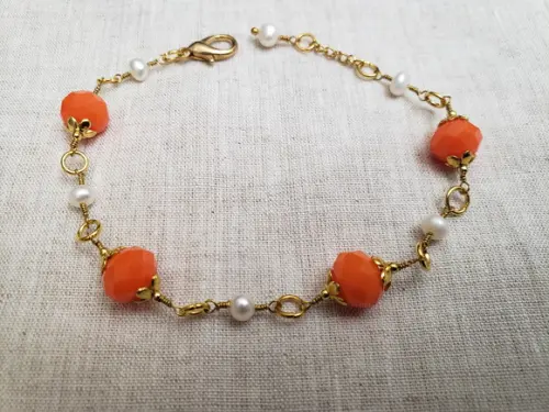 Pulseira Banhada com Cristais Laranja e Pérolas Naturais