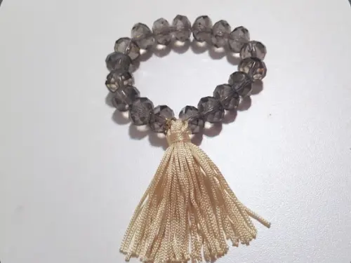 Pulseira de Cristais Fumê e Tassel