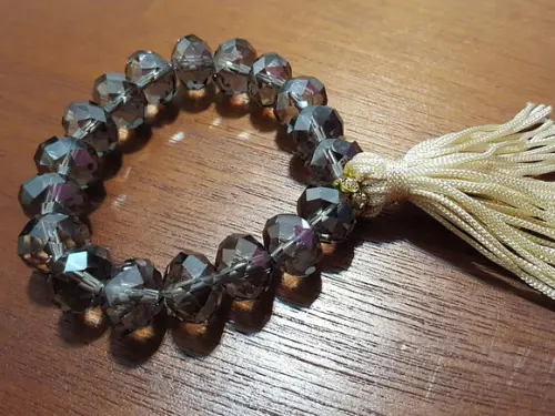 Pulseira de Cristais Fumê e Tassel