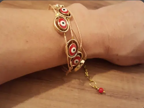 Pulseira de Olho Grego com Fios Encerados