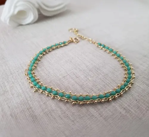 Pulseira Dourada com Cristais Azuis