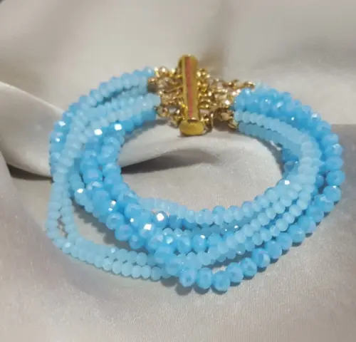 Pulseira Dourada com Cristais Azuis