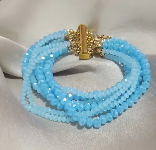 Pulseira Dourada com Cristais Azuis