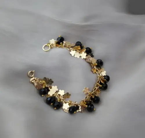 Pulseira Dourada com Cristais Negros