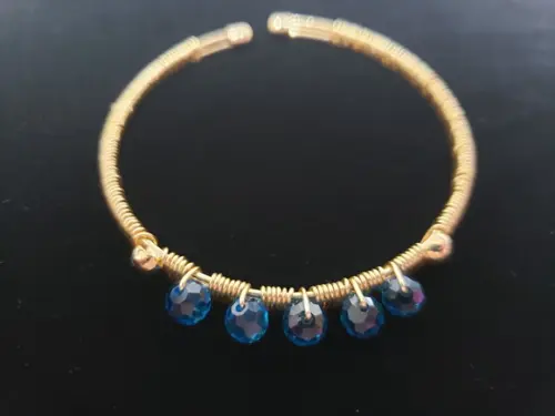 Pulseira Dourada com Cristal Azul Turquesa