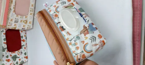 Necesseire do bebê - Porta fraldas com bolso para lenço umedeci