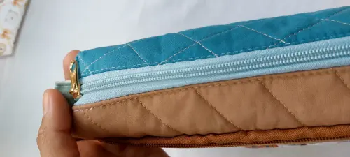 Necesseire do bebê - Porta fraldas com bolso para lenço umedeci