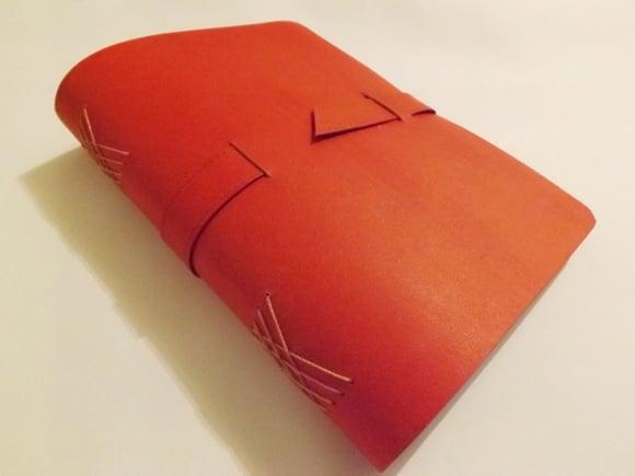 Agenda/caderno em recouro vermelho
