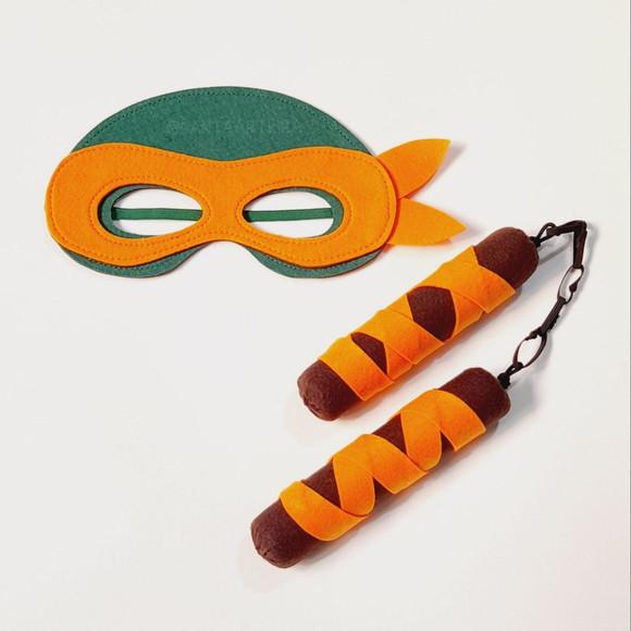 Kit Tartaruga Ninja Michelangelo com 1 Nunchaku /unidade.
