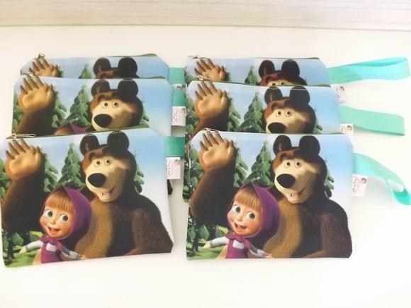 Necessarie A menina e o Urso
