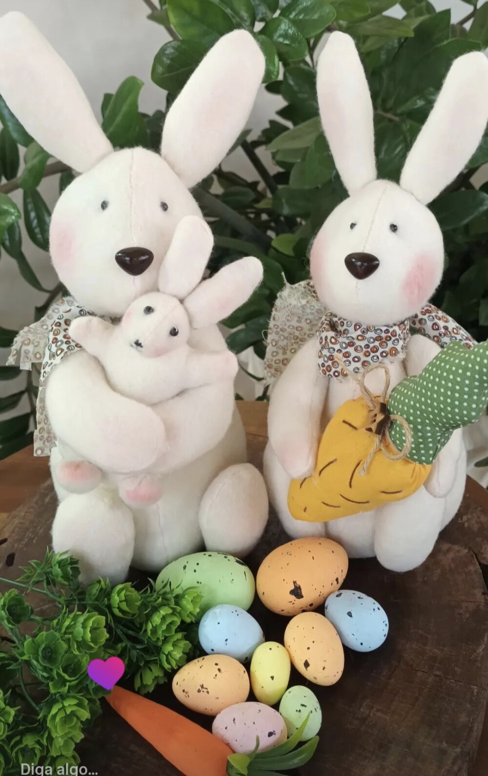 Casal de coelhos com seu filhote