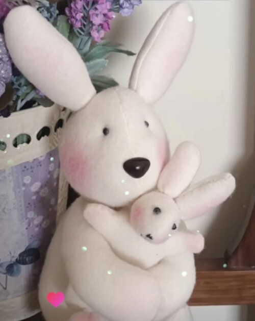 Casal de coelhos com seu filhote