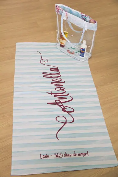 Toalha e bolsa de praia