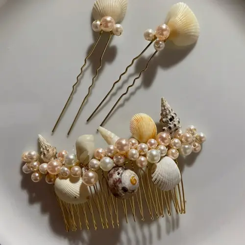 Arranjo conchas e pérolas