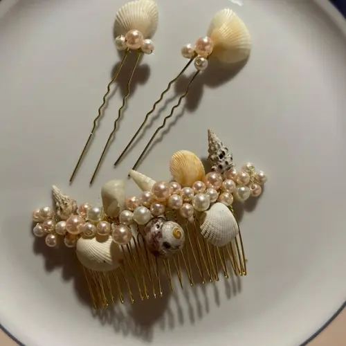 Arranjo conchas e pérolas
