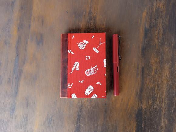Caderno A6 Música de Tecido e Couro