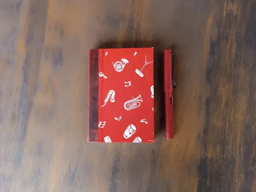 Caderno A6 Música de Tecido e Couro