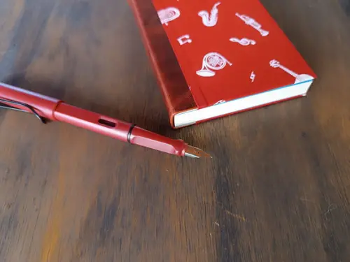 Caderno A6 Música de Tecido e Couro