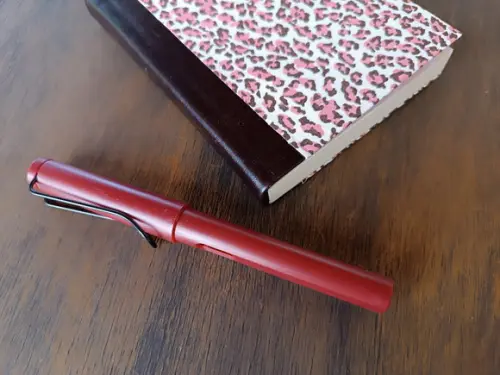 Caderno A6 Oncinha de Tecido e Couro
