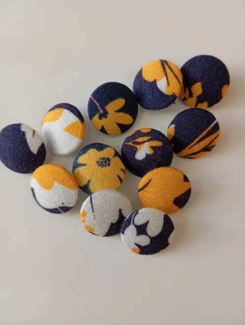 12 unid. de botões  bombê nº 20 "azul/amarelo"