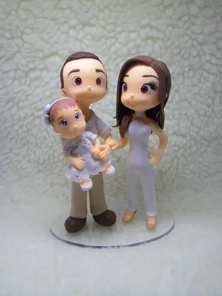 Casal com Bebê em Biscuit