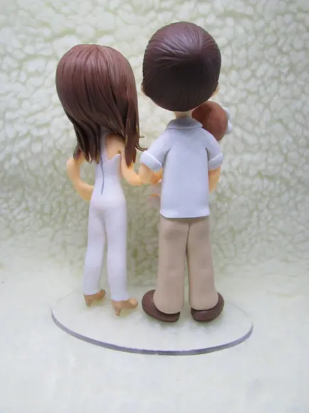 Casal com Bebê em Biscuit