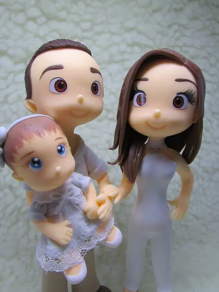 Casal com Bebê em Biscuit