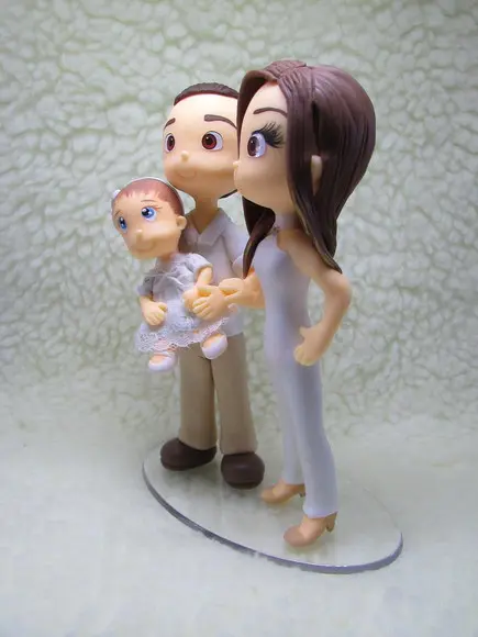 Casal com Bebê em Biscuit