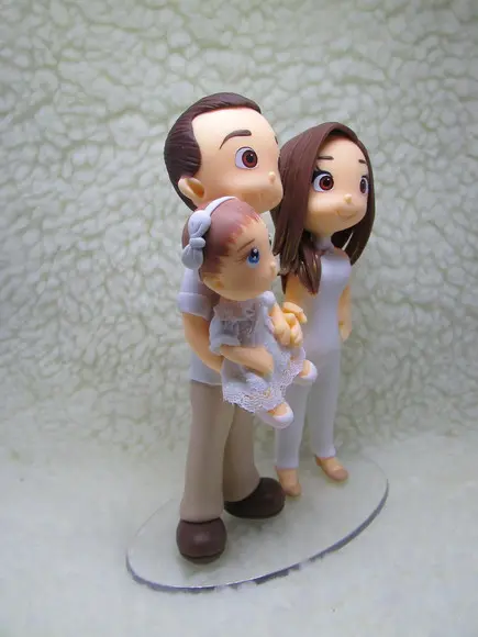 Casal com Bebê em Biscuit