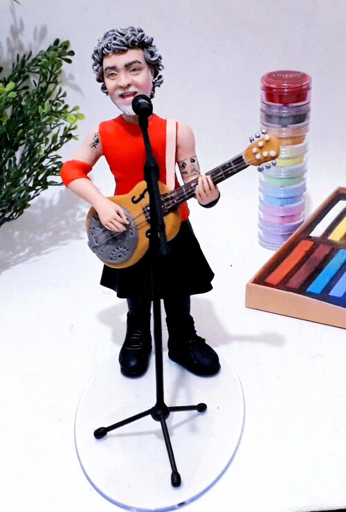 Escultura Humanizada em Biscuit - Artista