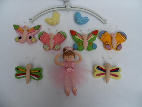 Móbile de berço musical menina.