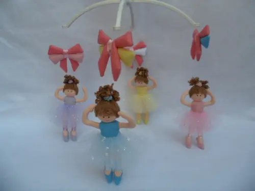 Móbile de berço musical bailarinas
