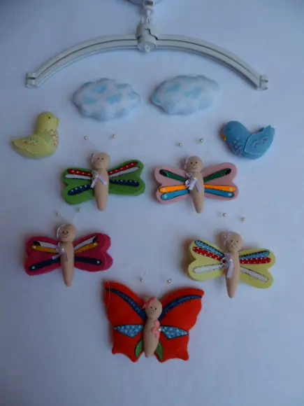 Móbile de berço musical menina.