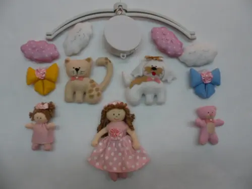 Móbile de berço musical menina.