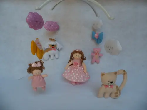Móbile de berço musical menina.